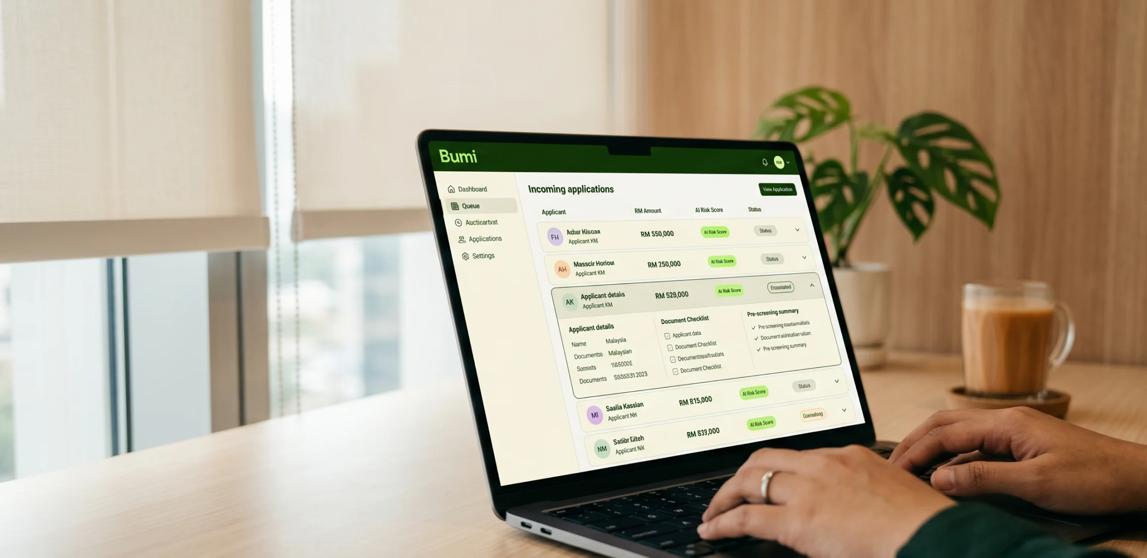 Bümi Lender console showing incoming applications on a laptop